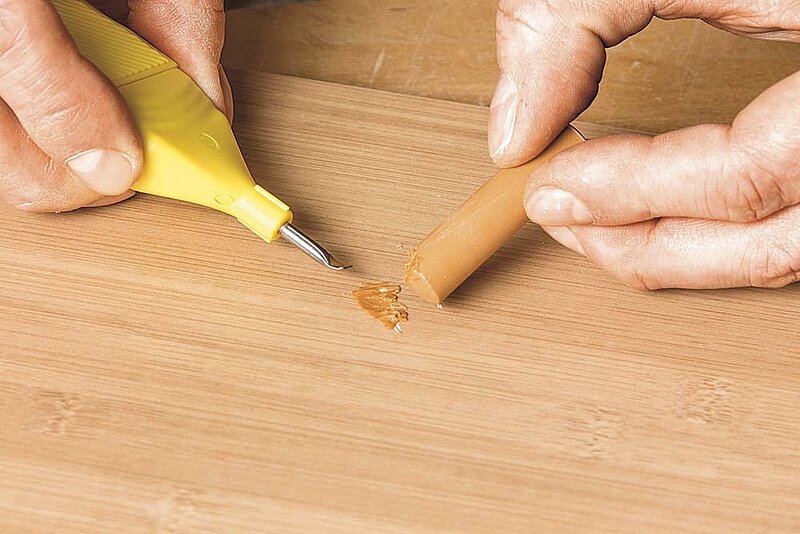 Kratzer im Parkett und Laminat beseitigen