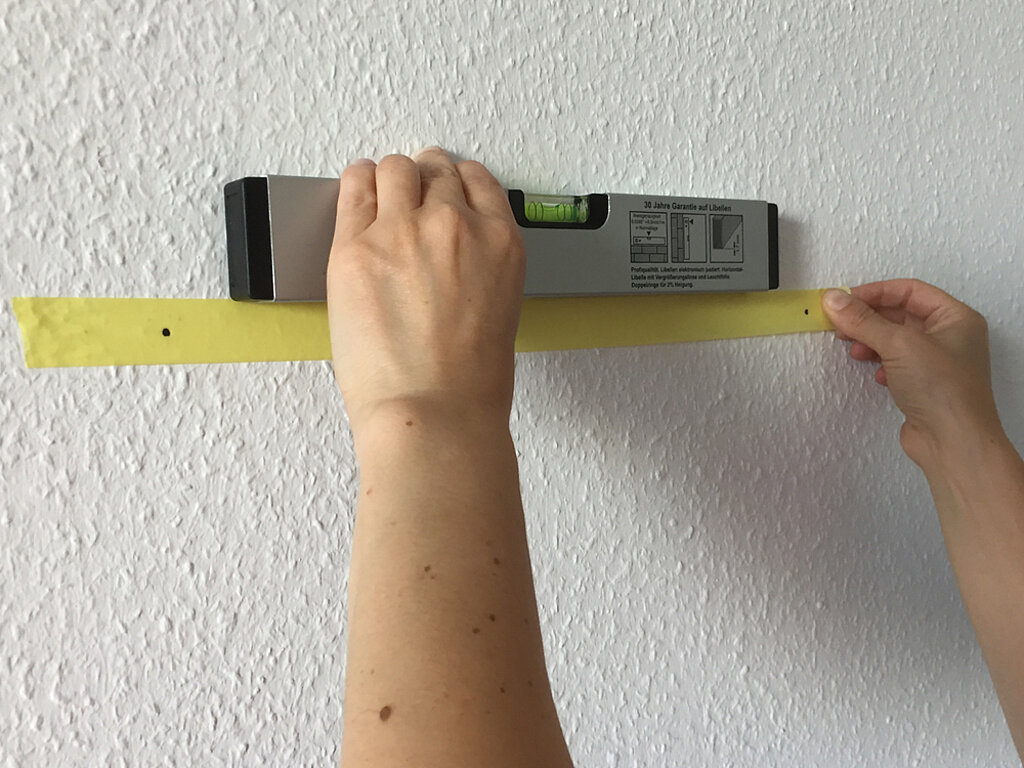 Bohrschablone: Bilder aufhängen