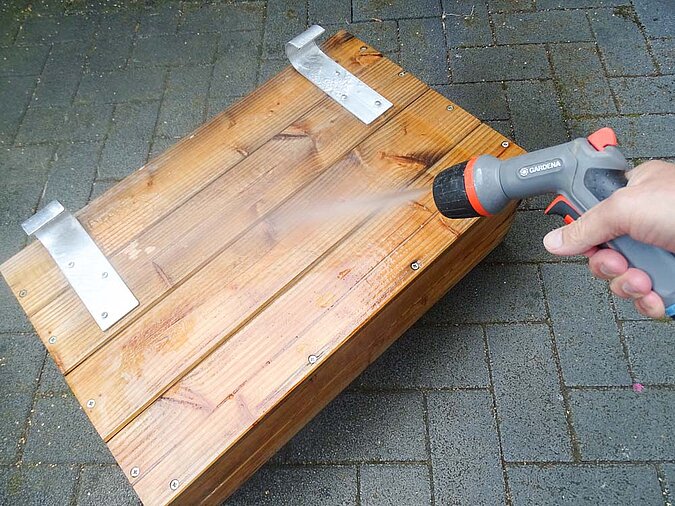 Holz abspülen