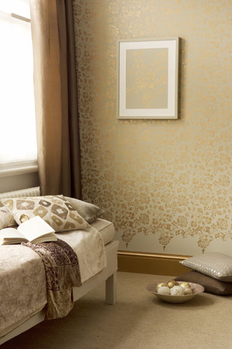 Goldornamente an der Wand
