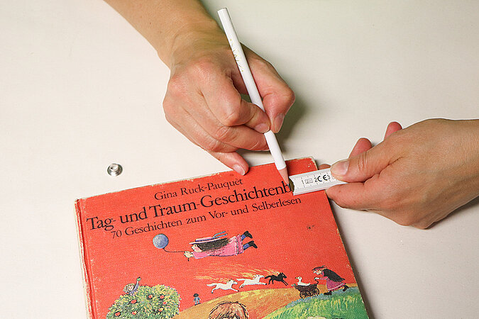 Buch wird zum Schlüsselbrett