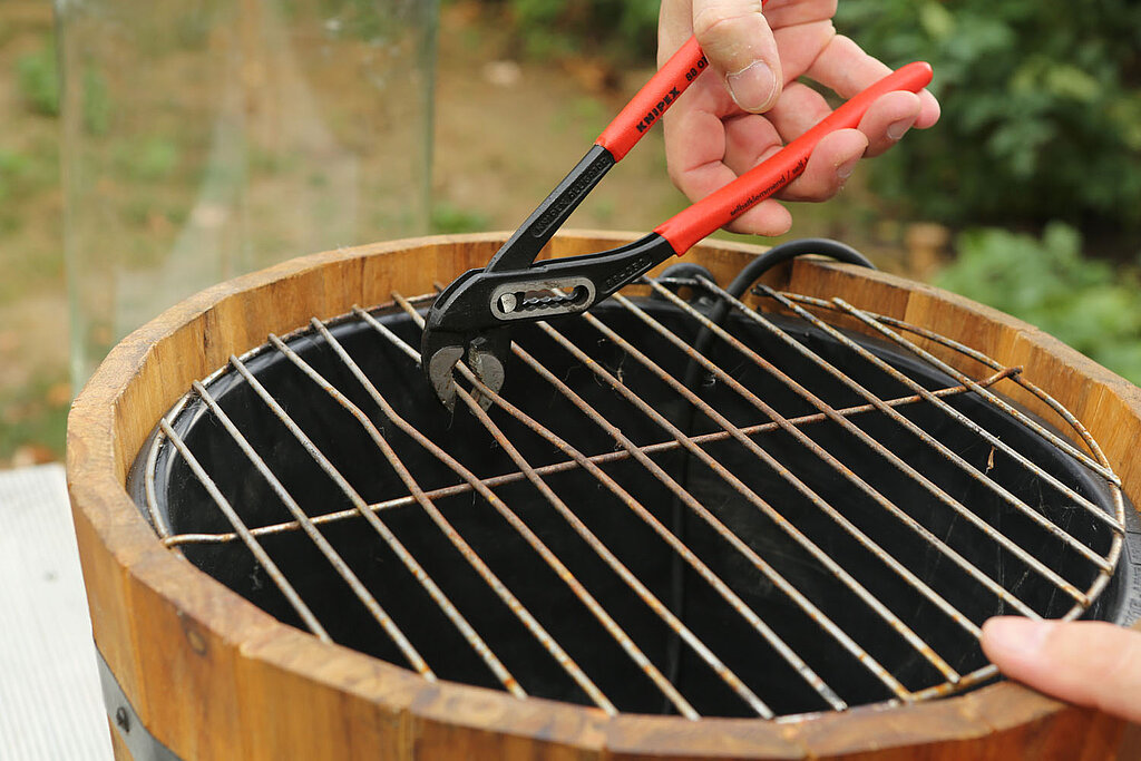 Grillrost biegen